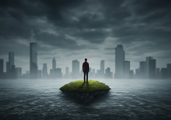 Person feeling isolated, world shrinking due to agoraphobia.